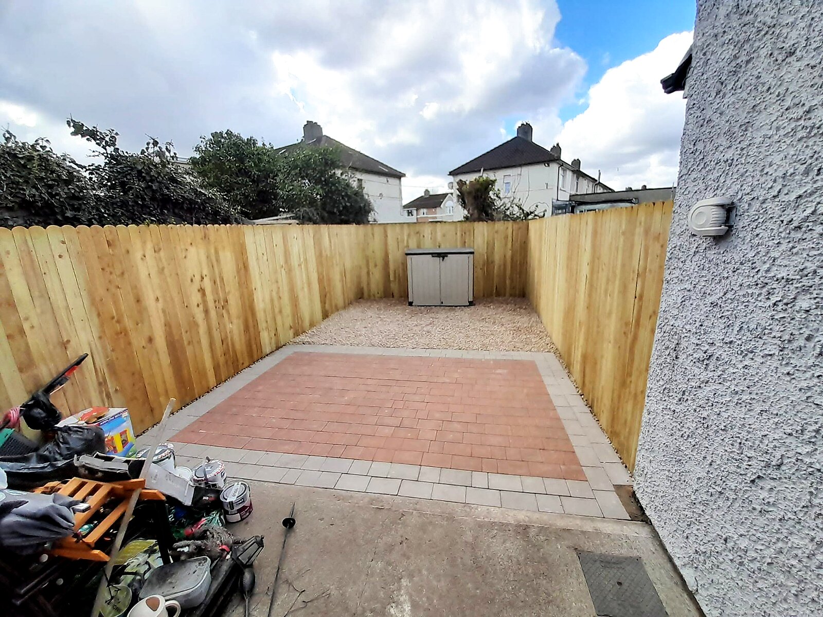 New timber fencing, block-paved patio with border and rose gold gravel